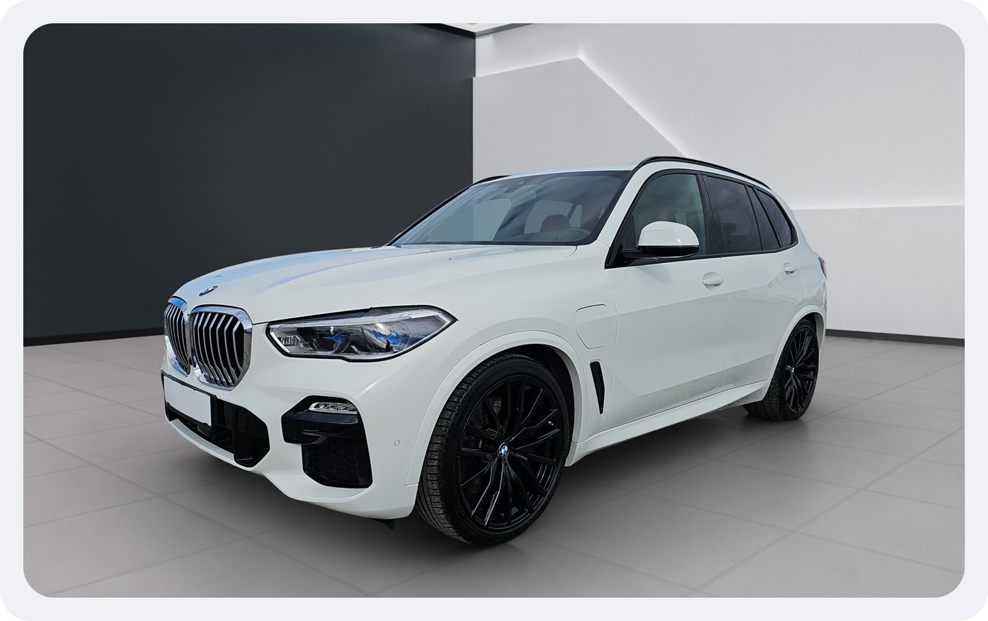 BMW X5 M Sport processed by autofox in a modern showroom